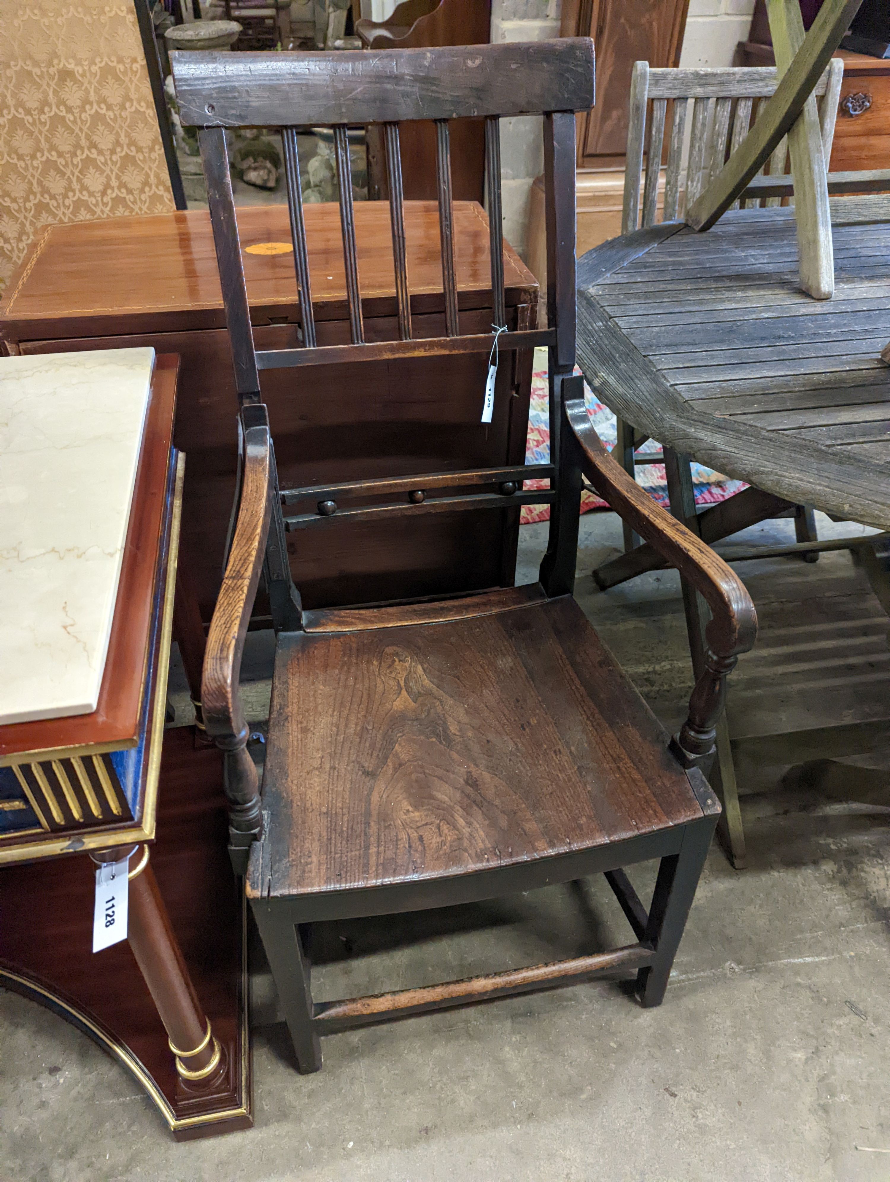 A Regency provincial ash and elm reclining wood seat elbow chair, width 54cm, depth 44cm, height 112cm